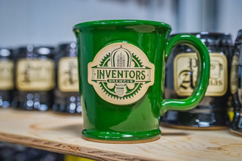 Green stoneware mug for Inventors Brewpub