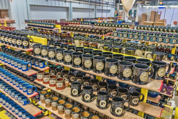 Large crowd of Sunset Hill Stoneware mugs