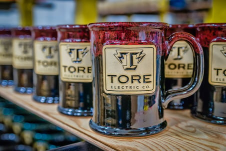 Tore Electric Co. Mugs